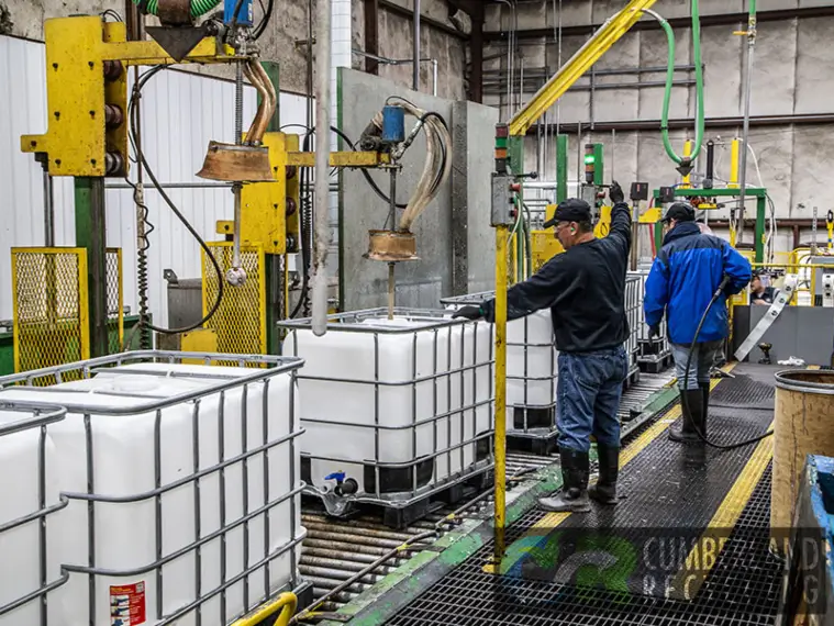 Employees balancing financial and environmental performance in facility recycling